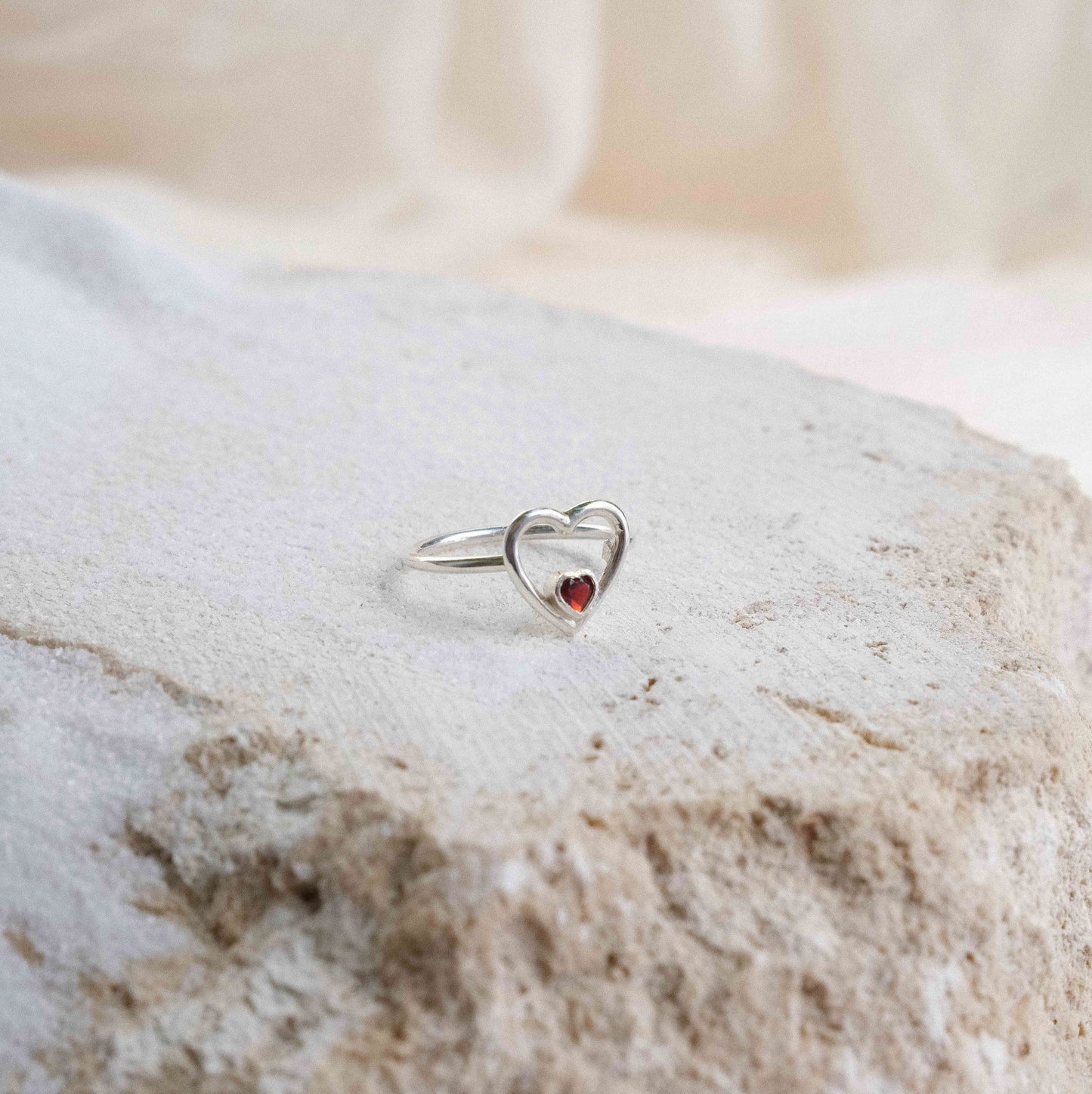 Amor Ring with Garnet